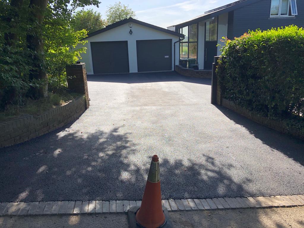 This is a photo of a bitumen driveway which is in the process of being installed by Coburg Road Tech