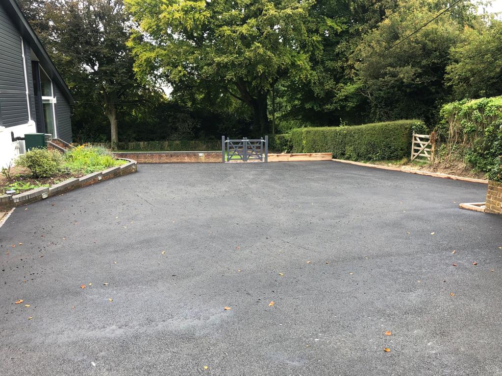 This is a photo of a bitumen driveway which is in the process of being installed by Coburg Road Tech